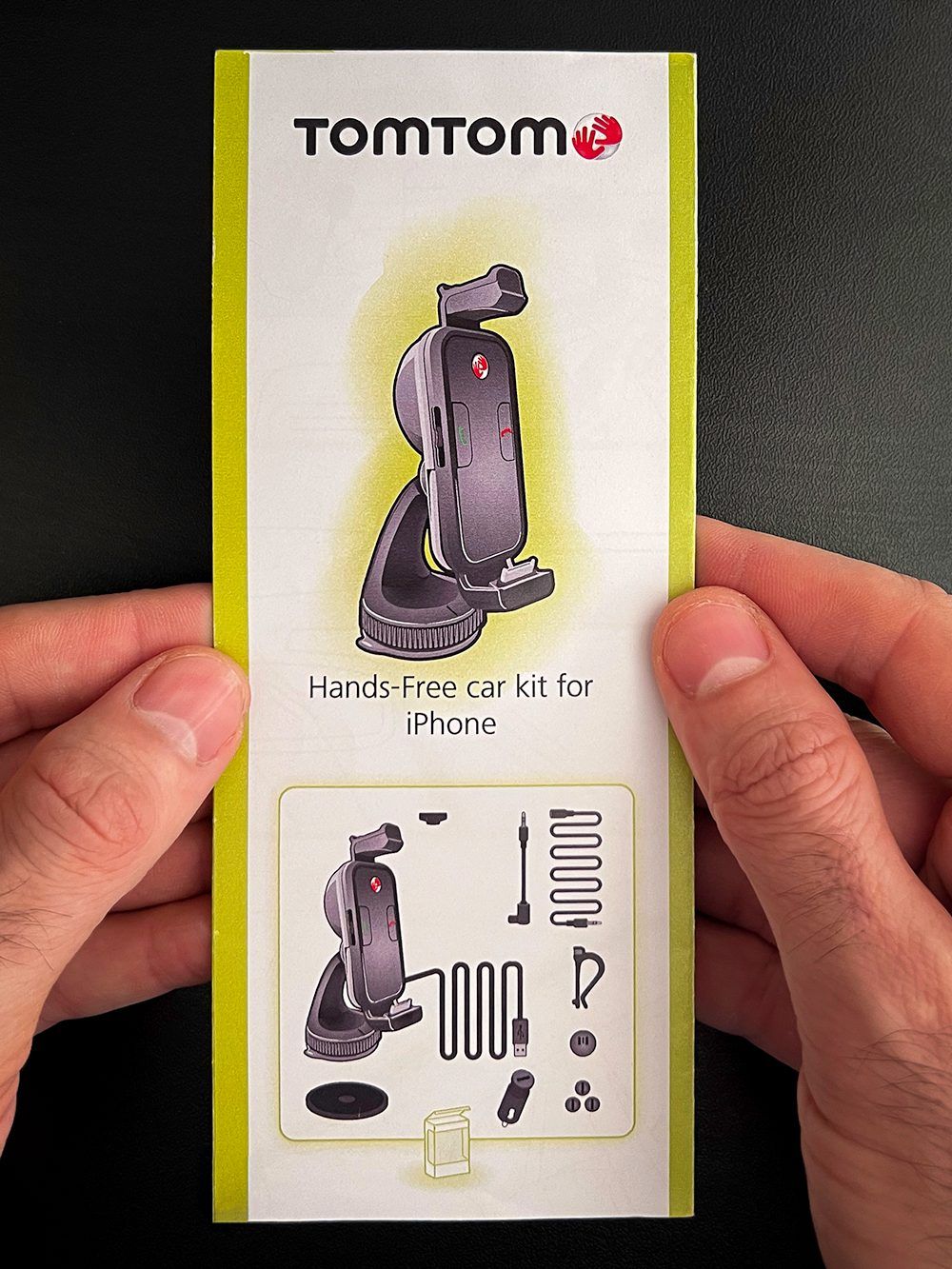 Image of TomTom Hand-Free Car Kit Manual close first page view. This is an image related to a project inside Pedro Rodrigues (Treze413) graphic design portfolio.